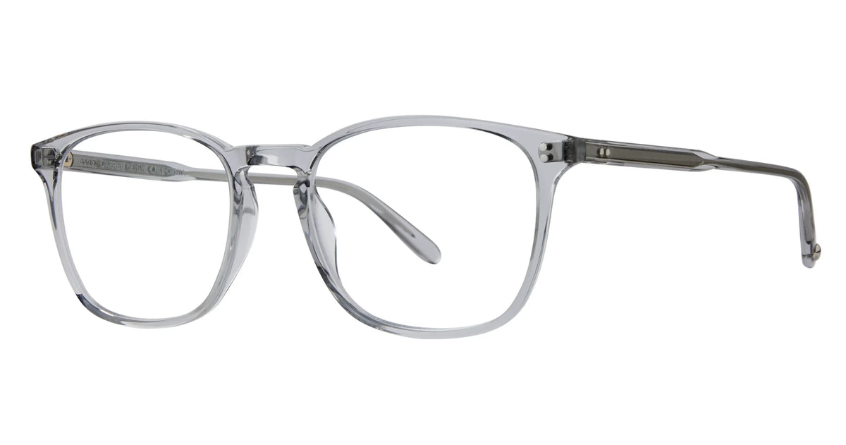 The Garrett Leight Boon 52 by Garrett Leight features clear, wide rectangular eyeglass frames crafted from transparent acetate with subtly rounded edges. The transparent arms complement the minimal, modern design, while the uncolored lenses offer a fresh and contemporary approach to everyday eyewear.