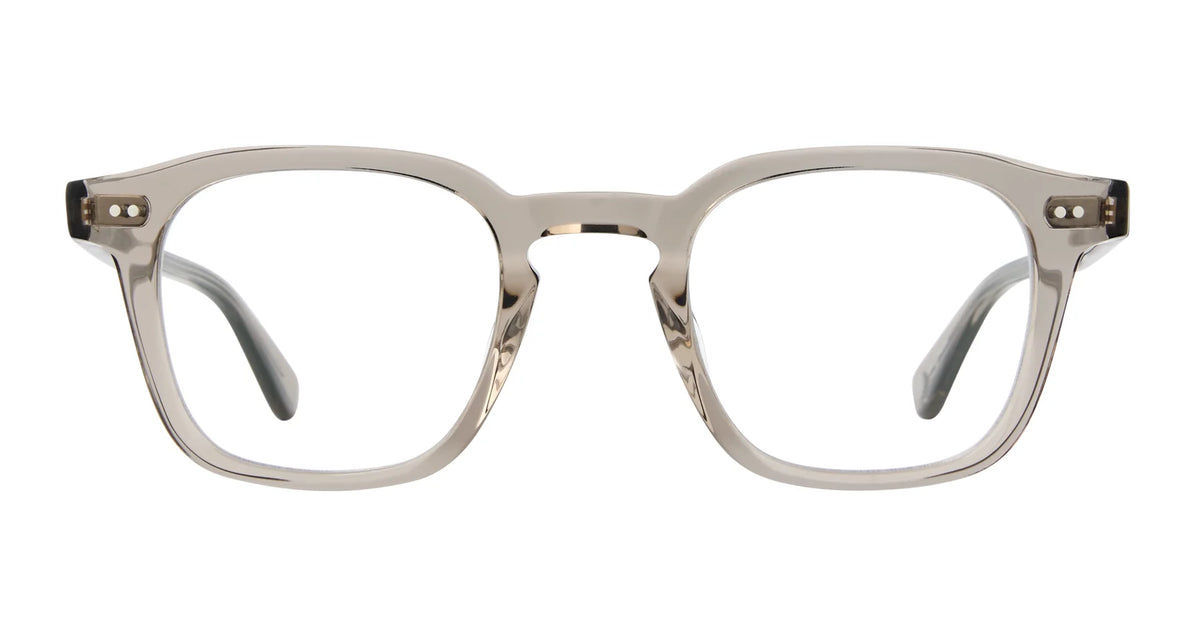 Garrett Leight Verdugo eyeglasses by Garrett Leight, shown from the front on a white background, feature a clear rectangular design with a transparent light gray frame and UV protection.
