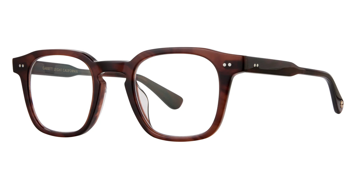 Garrett Leight Verdugo rectangular brown acetate eyeglass frames feature a keyhole bridge and silver rivet details on the front and temples, inspired by Garrett Leight’s signature Verdugo Sun sunglasses, shown on a white background.