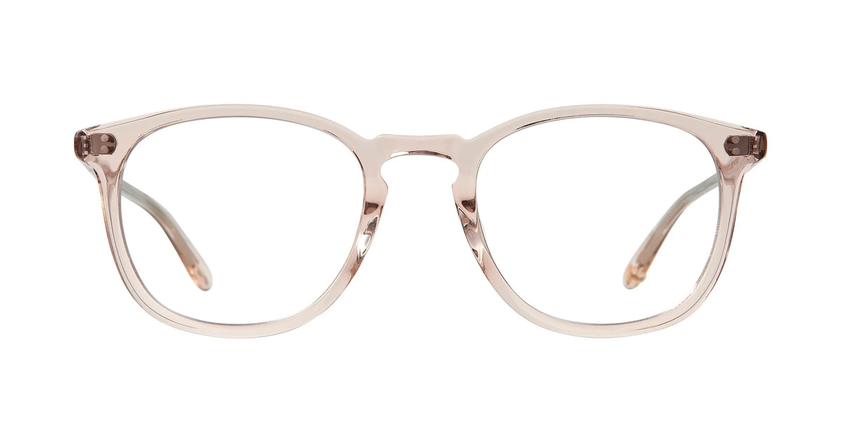 Introducing the Garrett Leight Kinney 49 by Garrett Leight: these clear, round optical glasses feature a subtle cat-eye silhouette and are expertly crafted from transparent, light beige cellulose acetate, showcased against a white background for a timeless look.