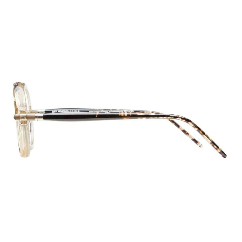 Side profile of handmade in Italy Kuboraum P1 eyeglasses featuring light-colored transparent frames and patterned tortoiseshell temples.