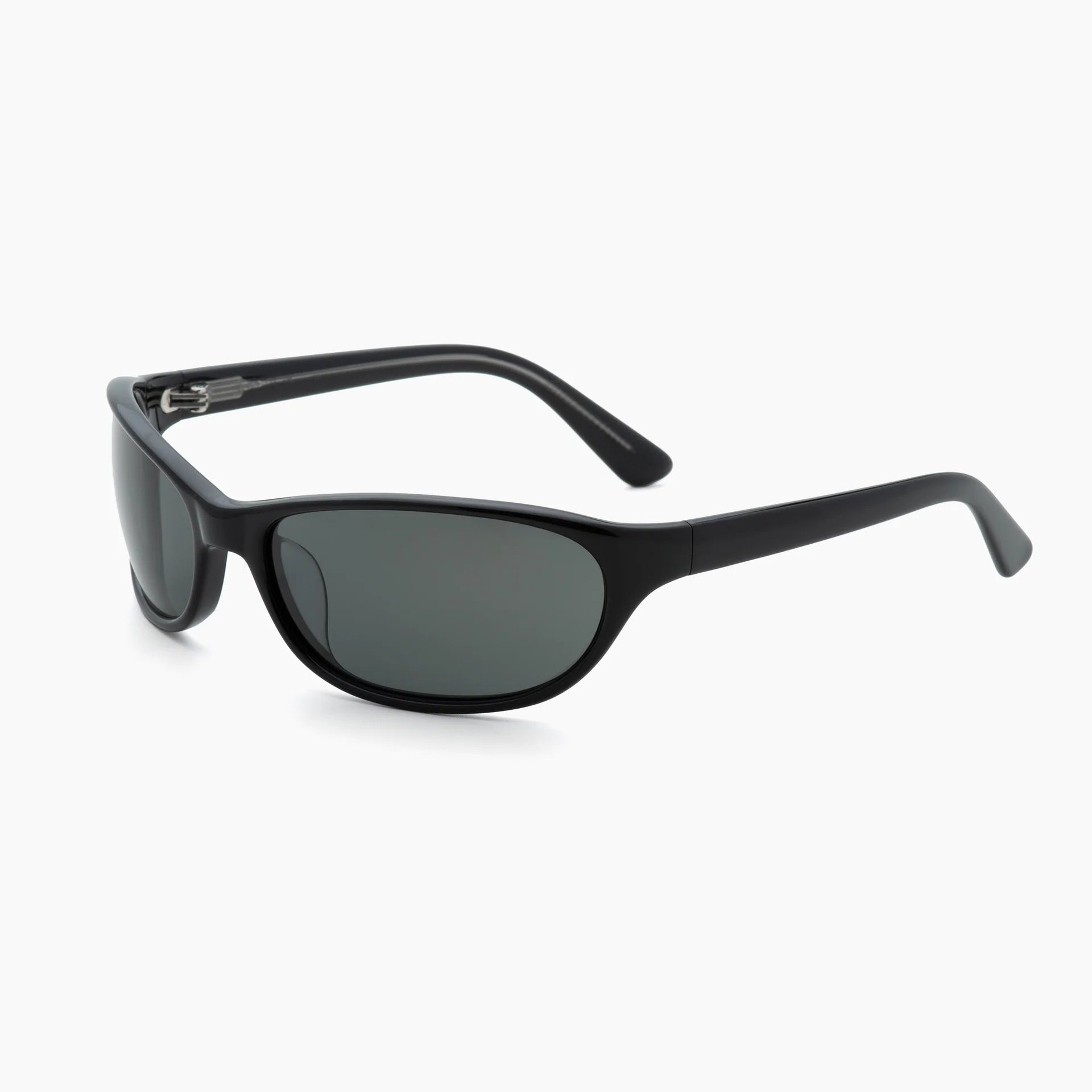 Black wrap-style sunglasses with dark grey lenses, thick curved temples, and a molded frame, shown at an angled side view on a white background.