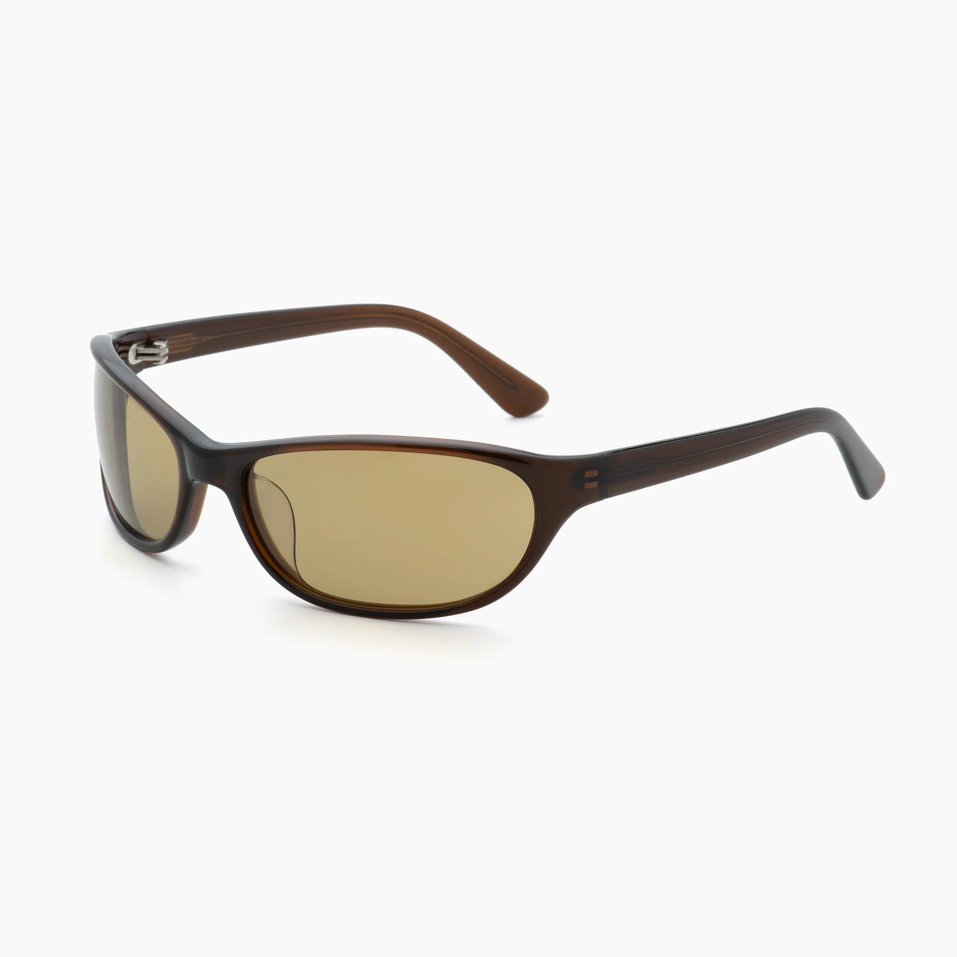 Brown wrap-style sunglasses with yellow-tinted lenses, thick curved temples, and a molded frame, shown at an angled side view on a white background.