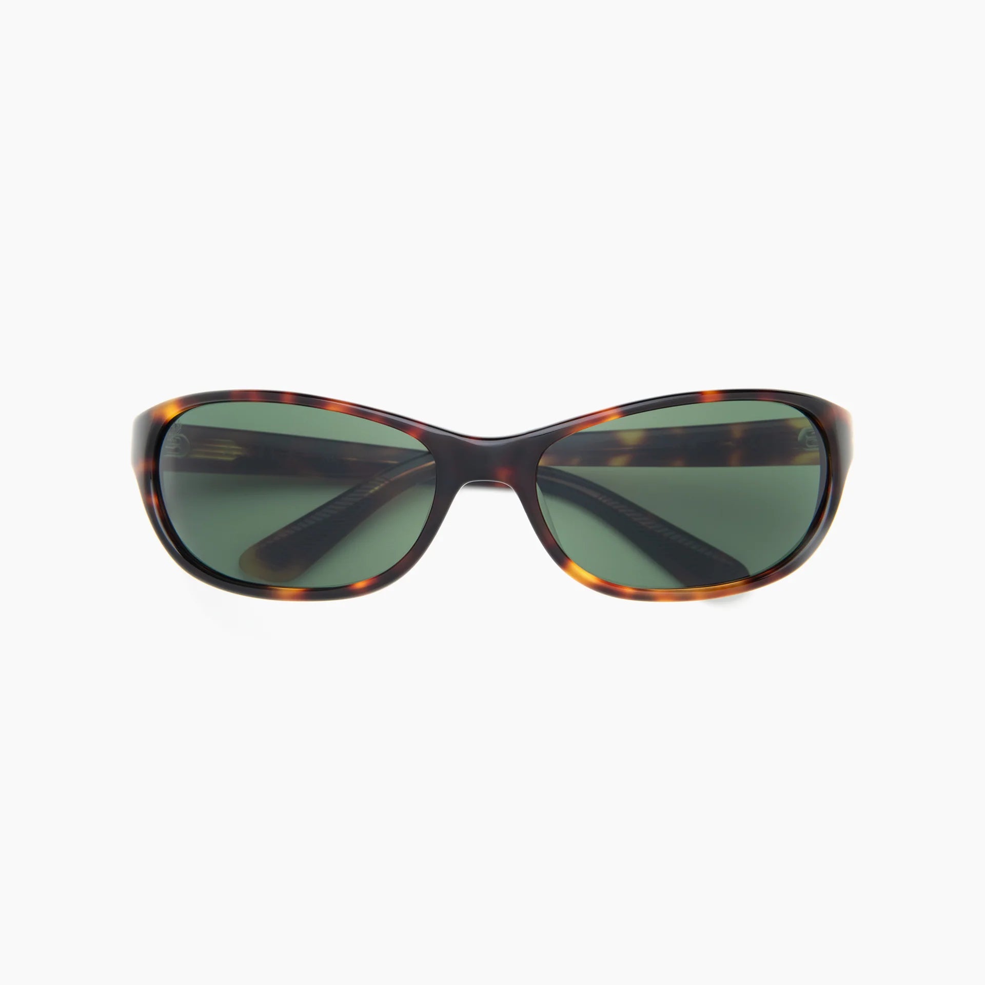 Brown tortoise wrap-style sunglasses with green lenses and a slim molded frame, shown front-facing on a white background.