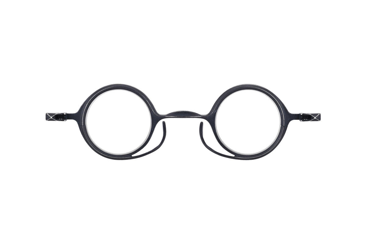 RIGARDS RG0105TI round black eyeglasses by RIGARDS feature thin pure titanium frames, nose pads, and slightly curved temple arms with a spring hinge, displayed on a white background.