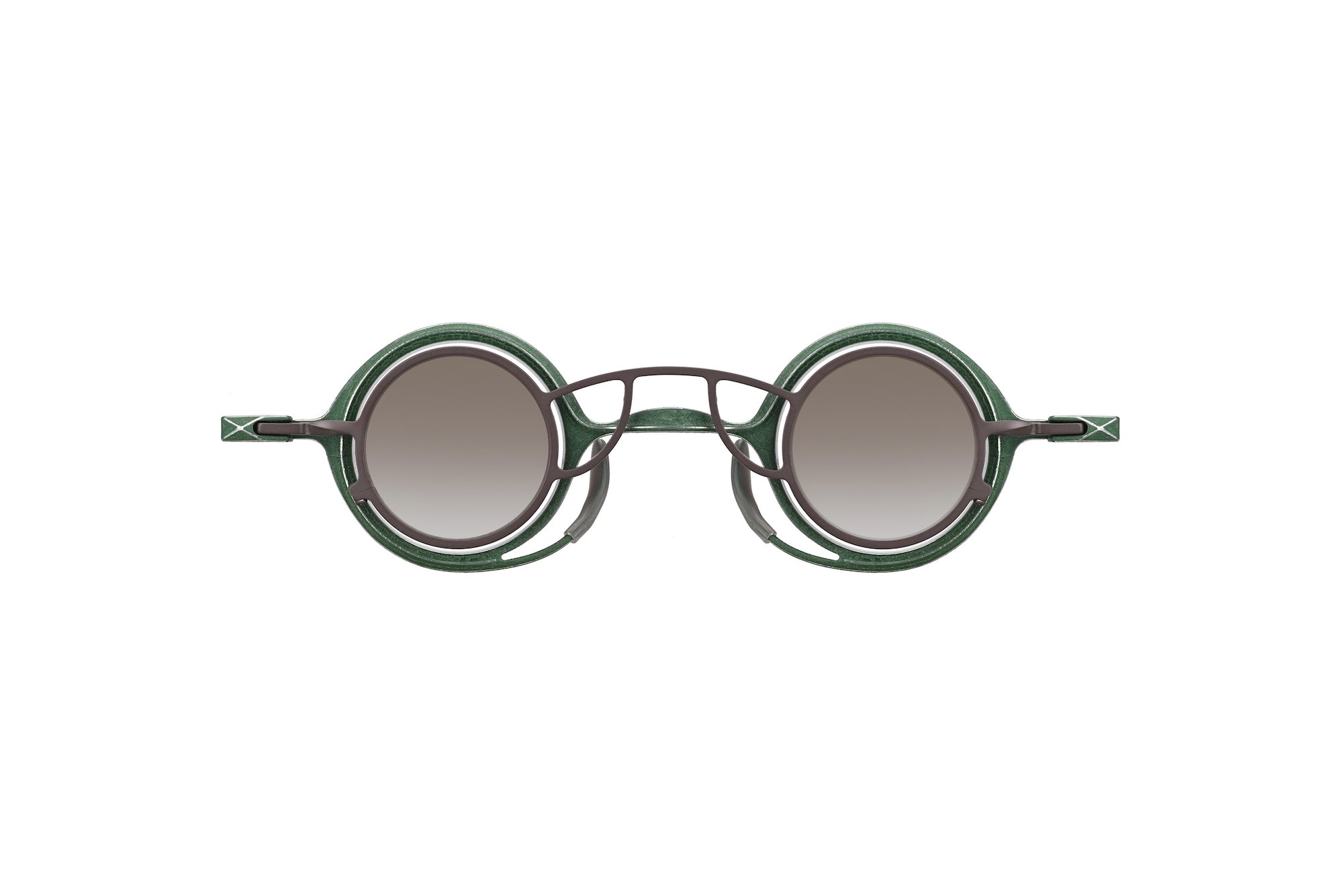 The RIGARDS RG0105TI sunglasses by RIGARDS feature round dark metal frames with double green rims, gray gradient UV400 sun lenses, and geometric detailing on the temples. These handcrafted eyewear pieces are showcased on a white background.