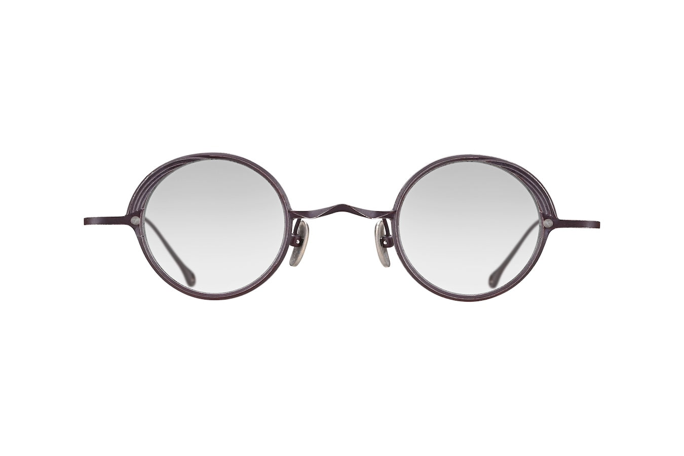 Oval eyeglasses with a dark brown frame and clear lenses, shown against a plain white background.