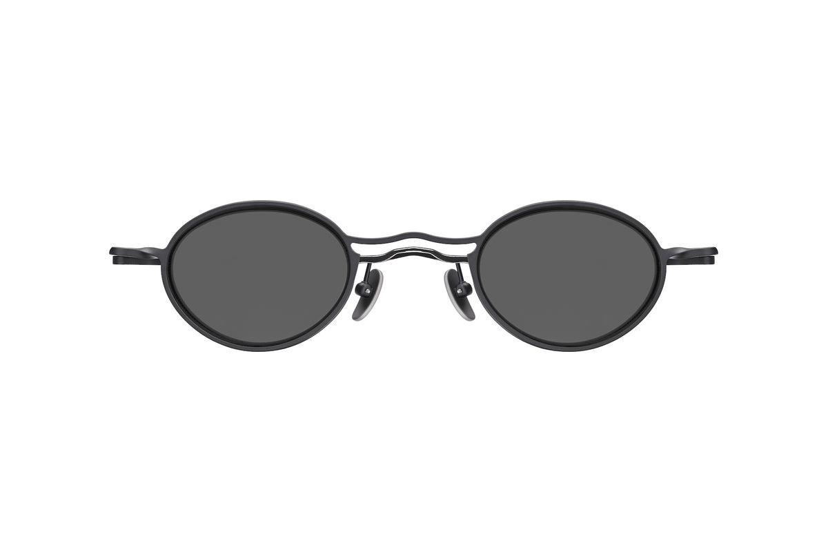 RIGARDS RG1010ZC handmade black oval sunglasses with a thin titanium frame and dark grey UV400 sun lenses.