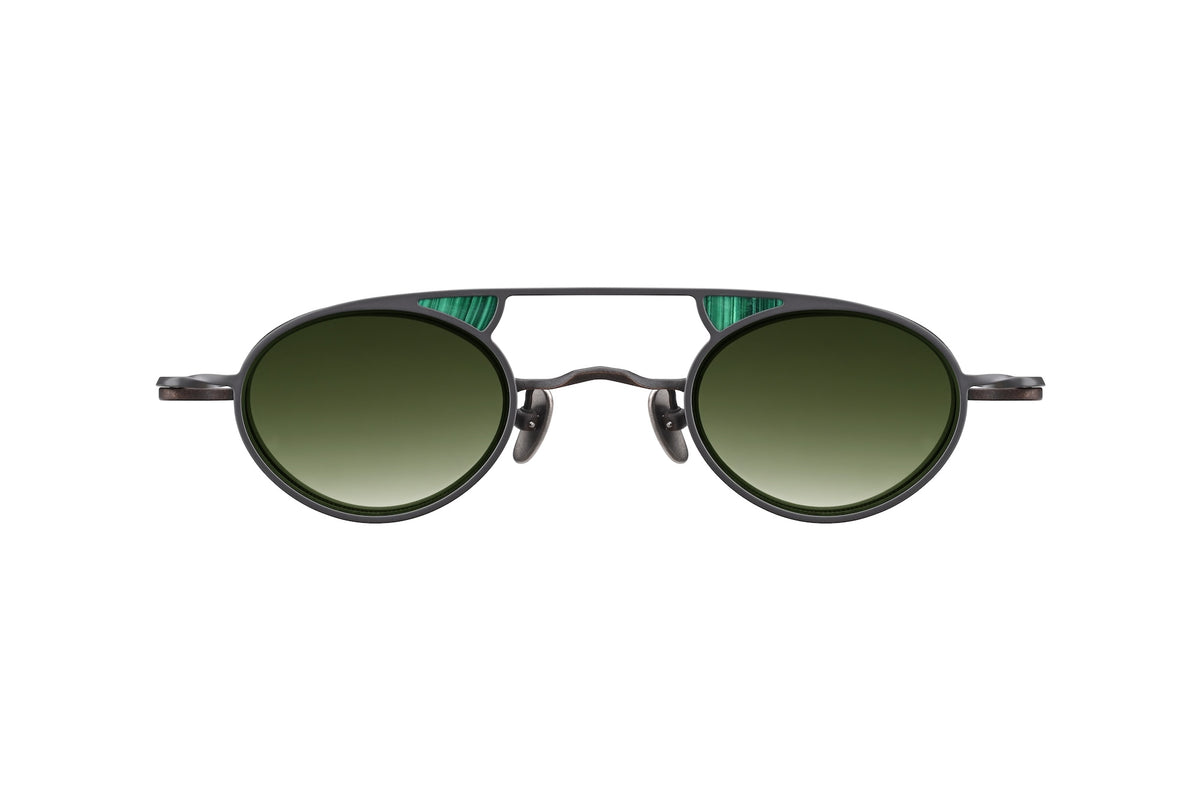 RIGARDS RG1010ZC handmade oval-framed sunglasses with titanium frames, dark green gradient lenses, and decorative green-striped accents at the top of the bridge.