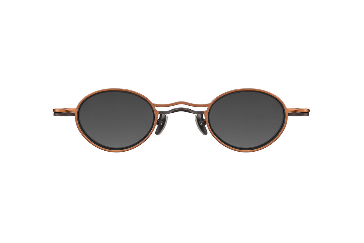 Handmade round RIGARDS RG1010ZC sunglasses featuring a copper-colored metal frame with dark grey UV400 sun lenses.