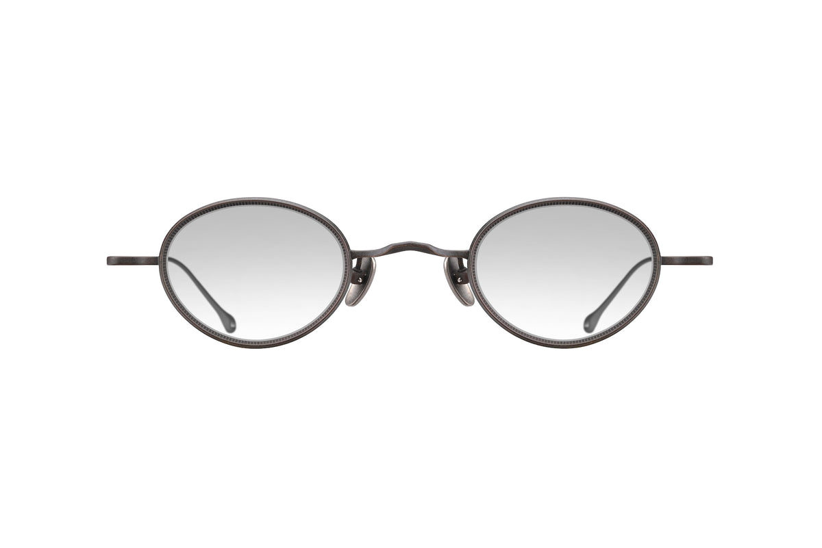 RIGARDS RG1010ZC handmade oval-framed sunglasses featuring thin titanium rims and gradient lenses.