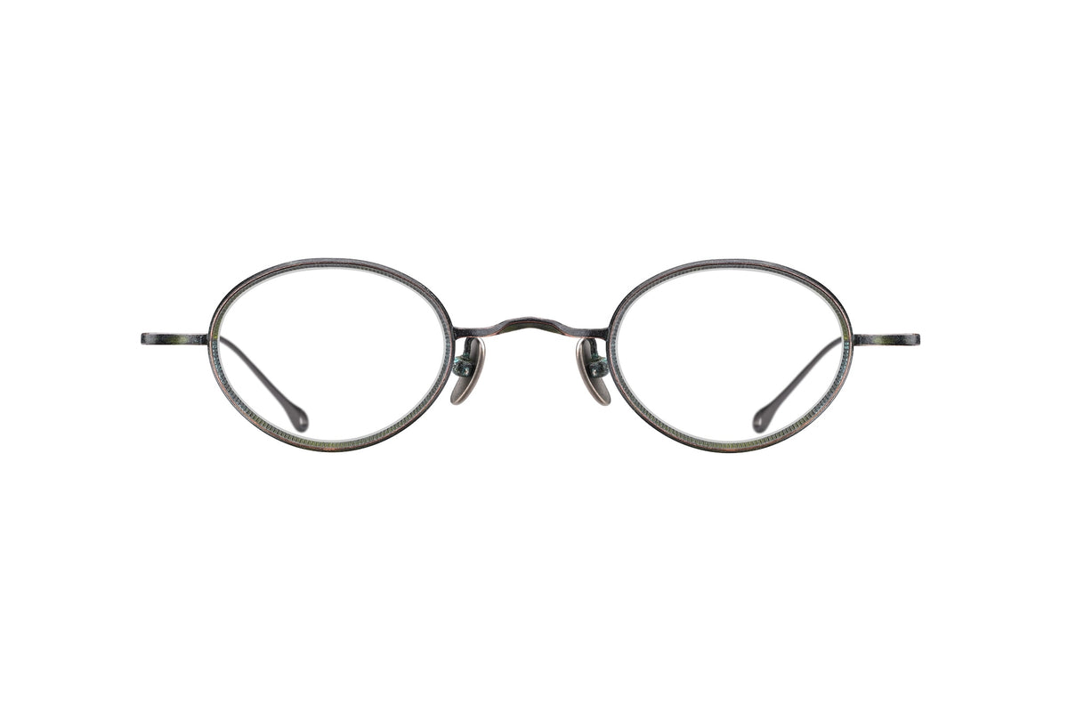 RIGARDS RG1010ZC oval-framed titanium glasses featuring thin, textured metal rims and a bridge.