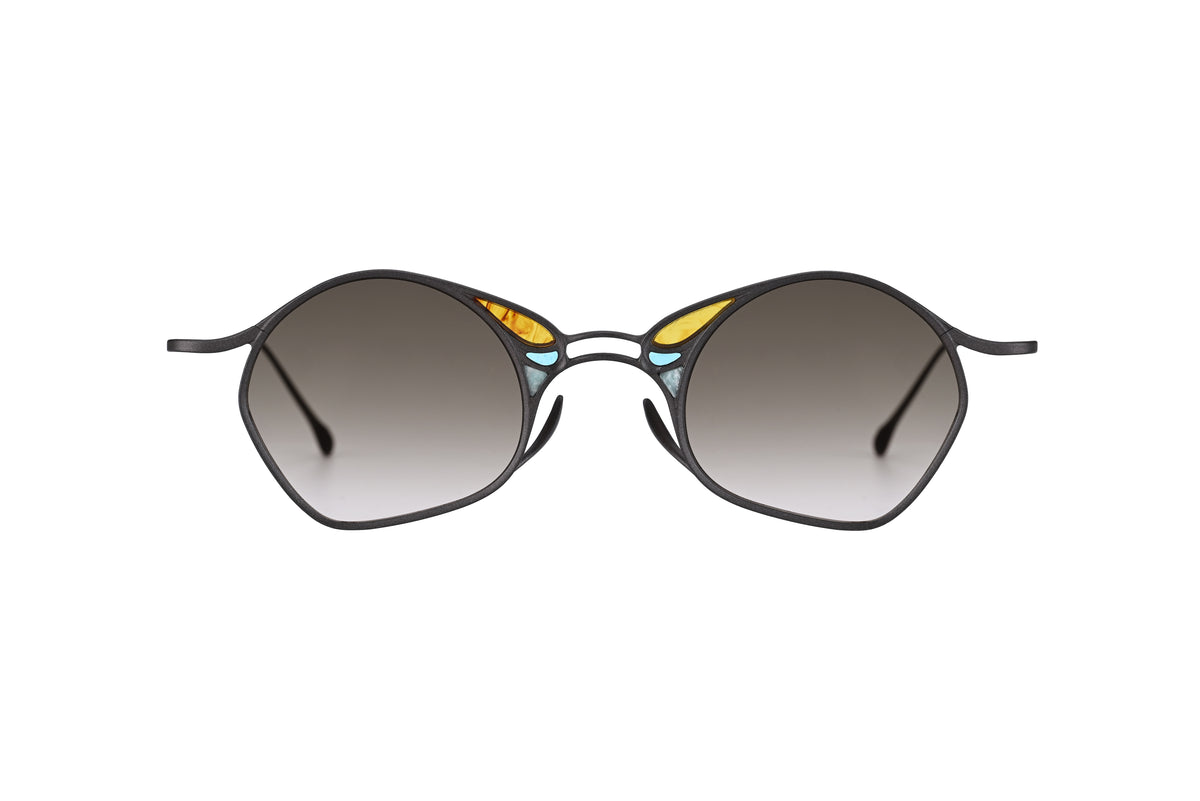 RIGARDS RG1032TI hexagonal sunglasses by RIGARDS, featuring black frames, dark gradient UV400 sun lenses, and decorative yellow and blue accents near the bridge, displayed against a white background.