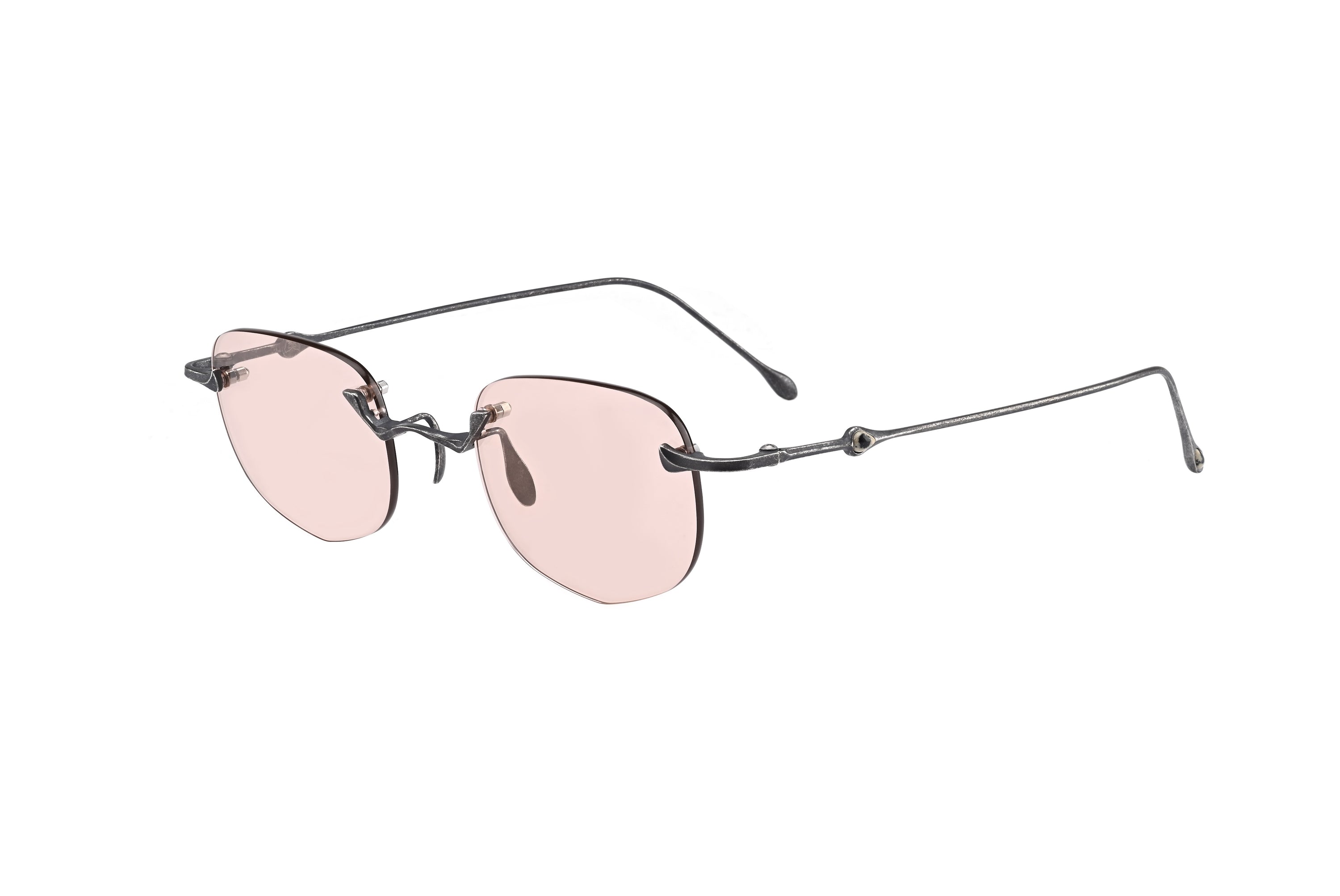 Rimless square sunglasses with thin dark metal frames and light pink tinted lenses, shown on a plain white background.
