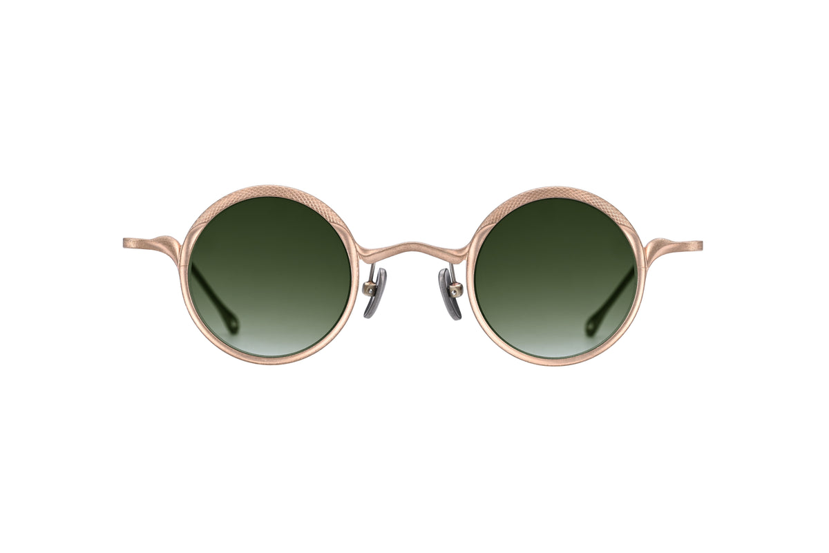 RIGARDS RG1199CU round sunglasses by RIGARDS feature gold-finished, pure copper frames with a slight texture and a subtle natural patina, paired with dark green UV400 sun lenses. Designed for timeless style, they include adjustable nose pads and elegantly curved temple arms, displayed here against a white background.