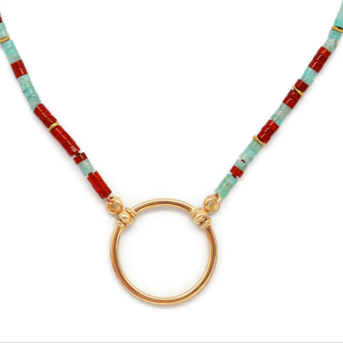 Necklace with red and green beads and a gold clasp on a white background
