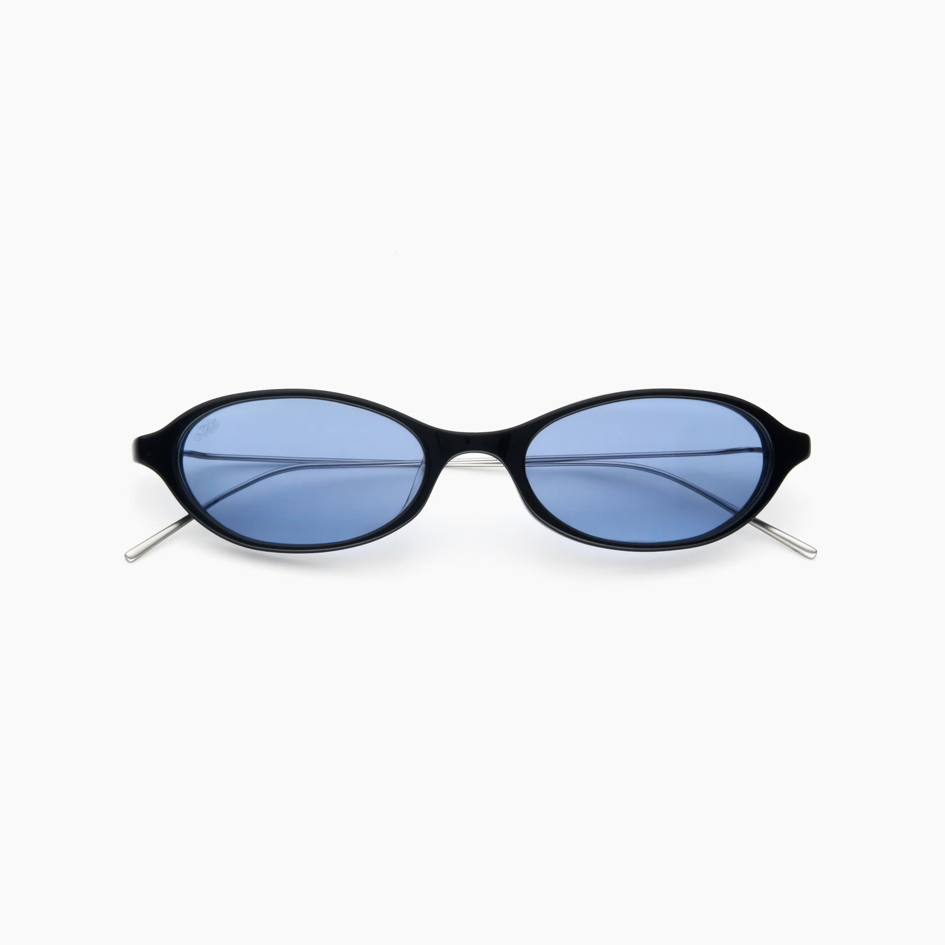Black oval sunglasses with blue-tinted lenses and slim silver metal temples, shown front-facing on a white background.