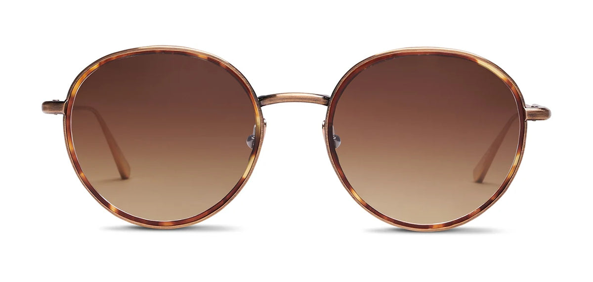 The SALT. Seine oversized round sunglasses by SALT. feature brown gradient lenses and a thin tortoiseshell frame, displayed on a white background.