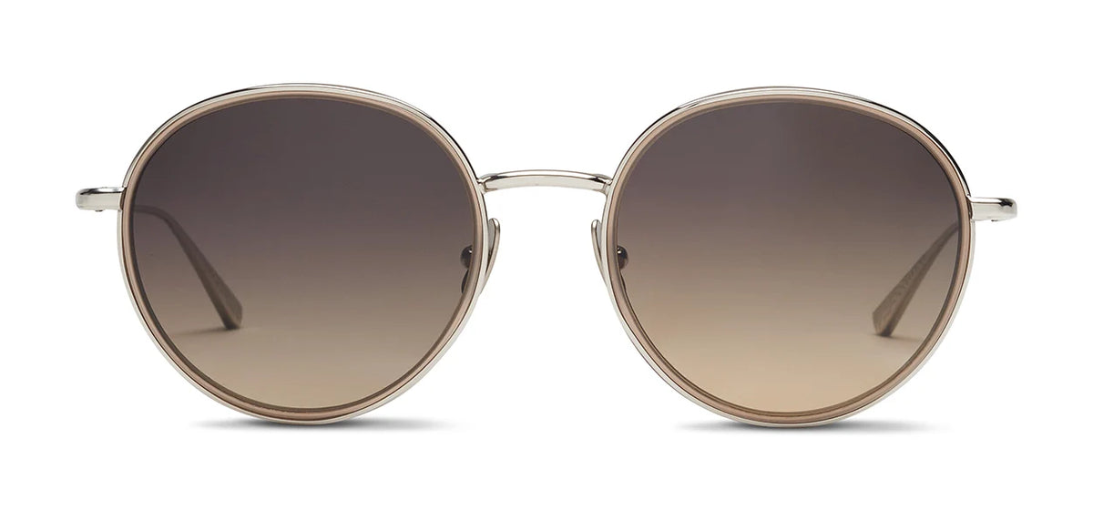 The SALT. Seine sunglasses by SALT. feature oversized round frames in thin gold metal with dark gradient lenses, displayed from the front on a white background.