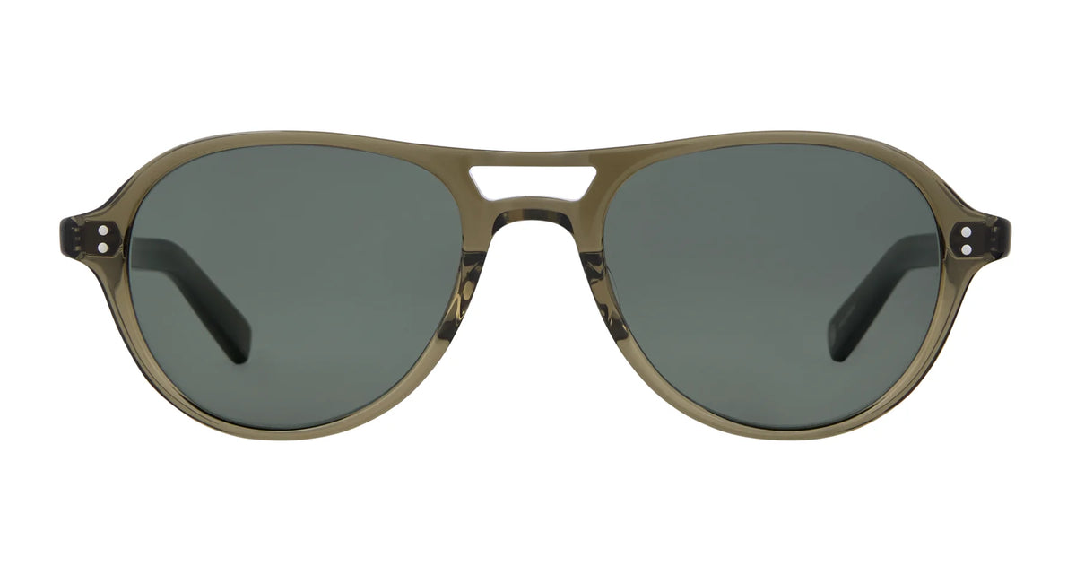 The Garrett Leight Hancock sunglasses by Garrett Leight are olive green aviators with dark lenses, displayed from the front against a white background. The frame features a subtle cutout on the bridge above the nose and offers dependable UV protection.