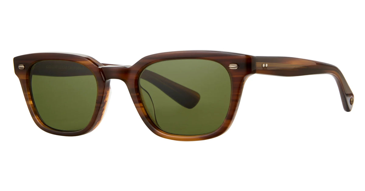 Garrett Leight Lugo sunglasses by Garrett Leight, featuring a brown tortoiseshell rectangular frame with green-tinted lenses, are shown from an angle highlighting both the front and side profiles. These vintage-inspired sunglasses combine timeless style with dependable UV protection.