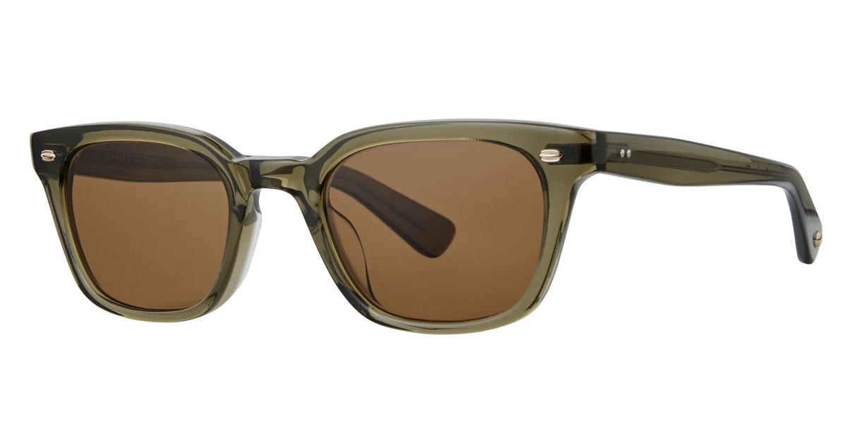 Garrett Leight Lugo sunglasses by Garrett Leight feature an olive green translucent square frame with brown lenses, metallic accents near the hinges, and a glossy finish. These vintage-inspired sunglasses provide stylish UV protection while adding a timeless flair to any look.