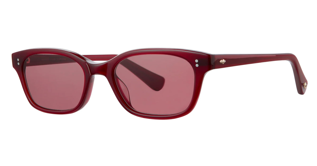 The Garrett Leight Chaparral by Garrett Leight features red rectangular frames with matching red lenses, complemented by small silver accents on the front corners and temples. Inspired by classic cat-eye sunglasses, this pair offers 100% UV protection and has slightly tapered, curved arms for a comfortable fit.