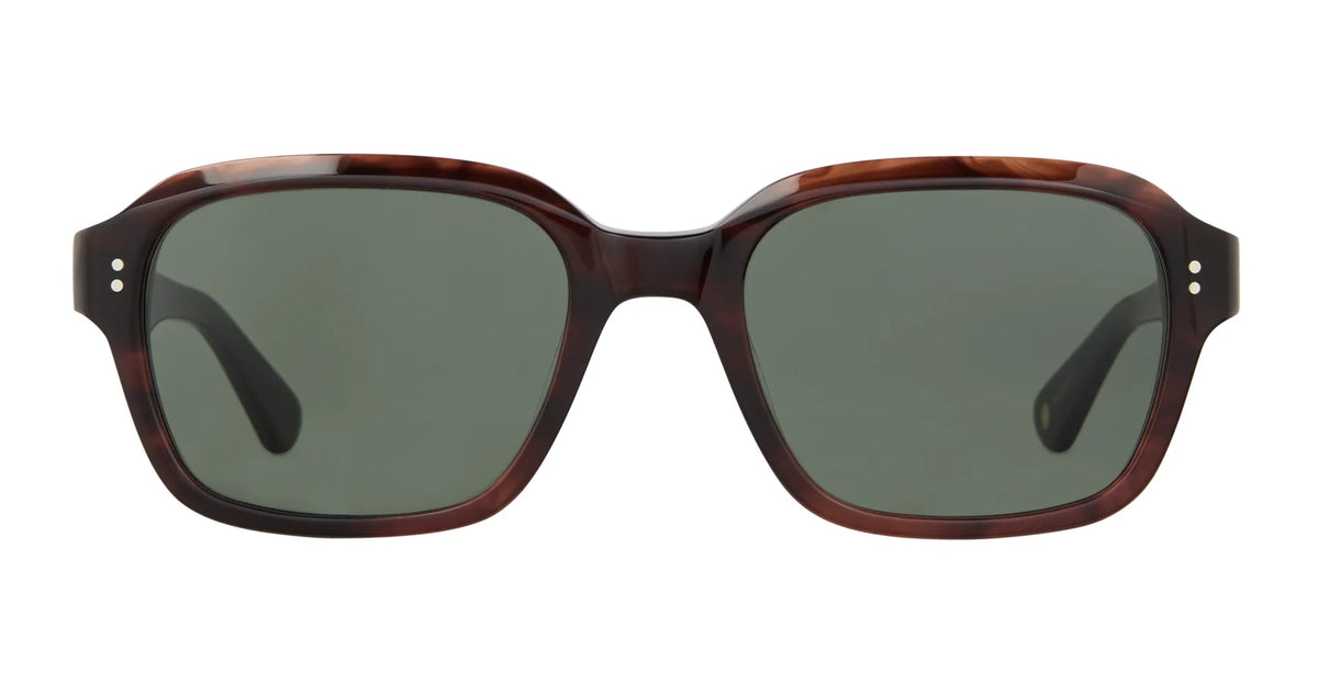 Front view of the Garrett Leight Dominguez vintage square sunglasses, featuring dark green premium glass lenses with 100% UV protection set in a glossy brown tortoiseshell frame. The design includes two small metal dots on each side near the hinges.