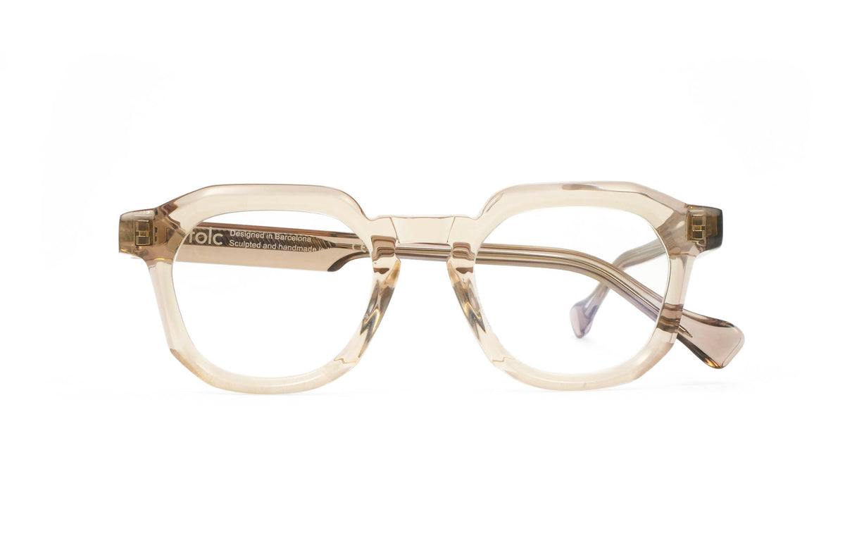 Folc Tempo sunglasses in translucent beige, featuring a geometric-rimmed design crafted from Italian-made acetate.