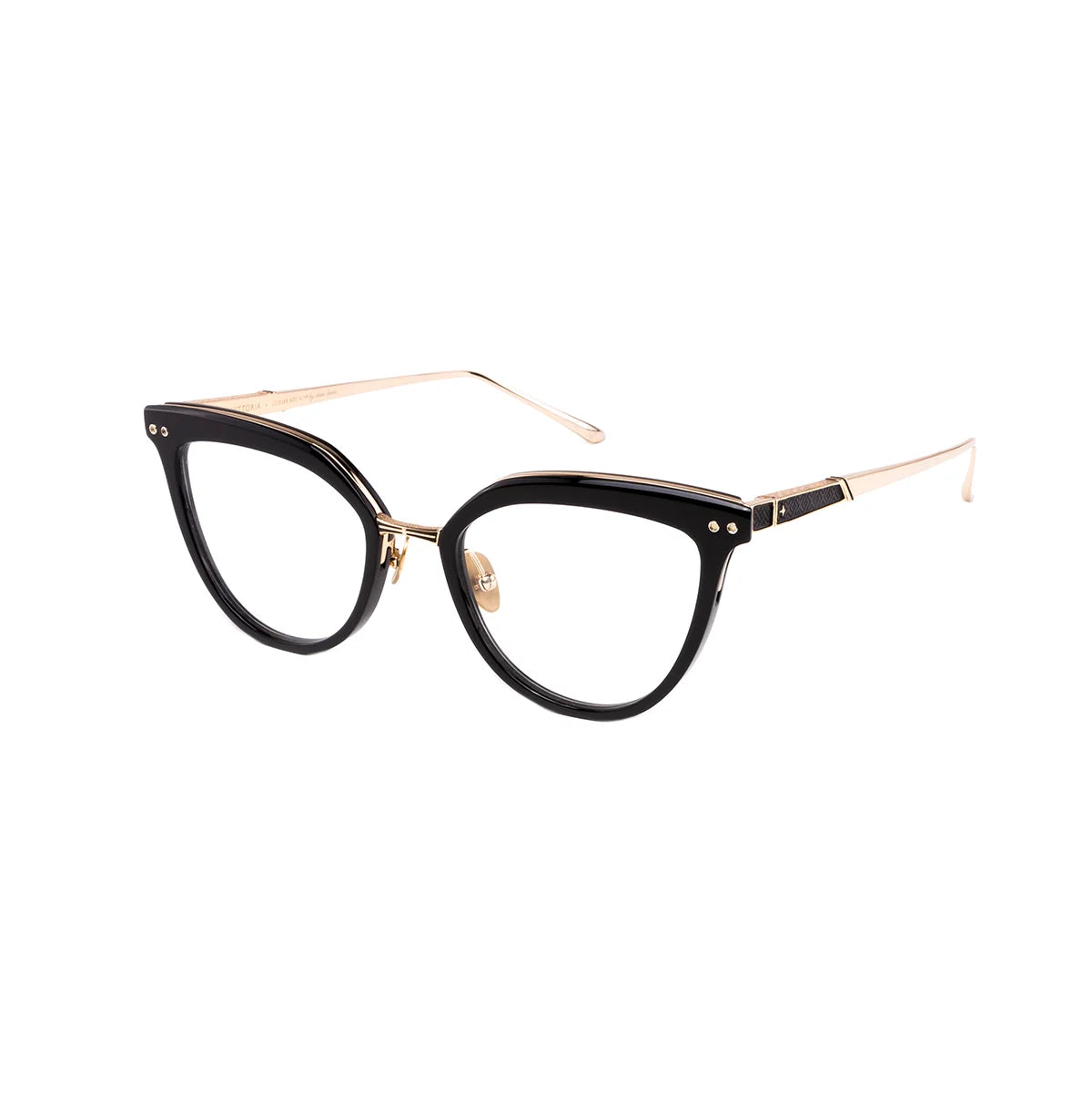 Leisure Society Vittoria eyeglasses by Leisure Society showcase bold, retro-inspired black cat-eye frames with slightly upturned corners, complemented by gold metal arms and nose pads. Expertly handmade in Japan, they are displayed against a white background.