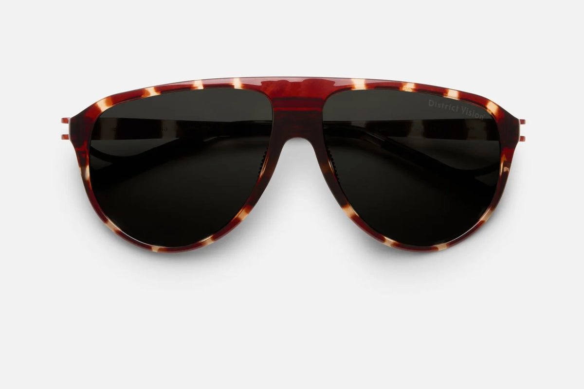 District Vision Yukari Windshield sunglasses in a tortoiseshell-patterned heritage aviator shape with dark, oversized lenses.