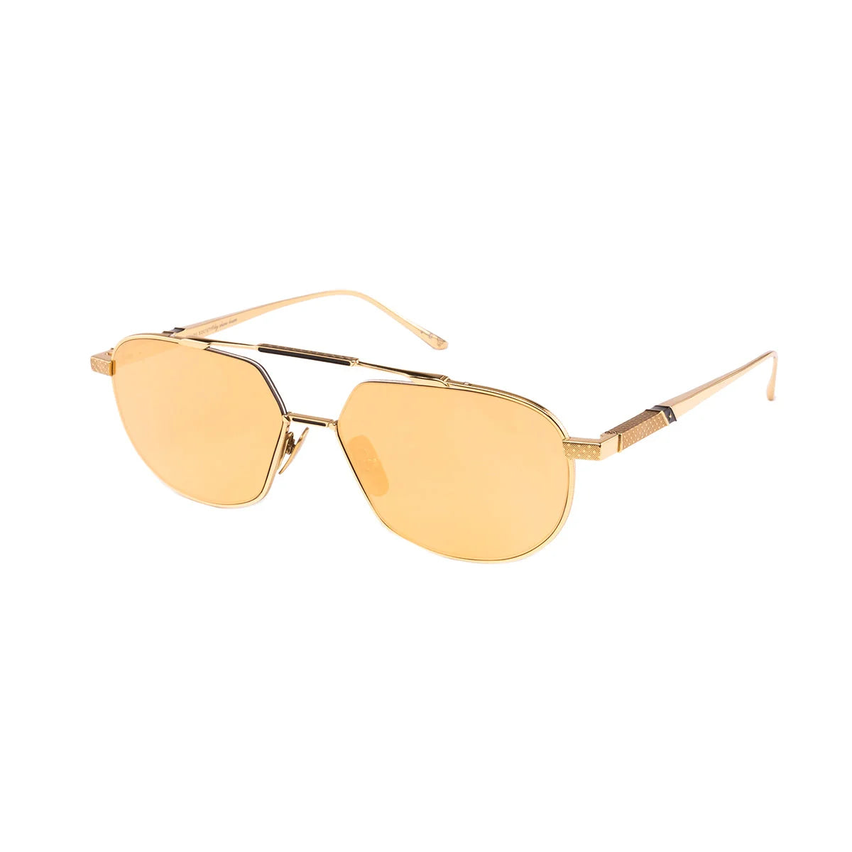 Leisure Society Yuma sunglasses by Leisure Society showcase gold ion-plated, gold-framed aviator style with yellow-tinted lenses, thin arms, and a double bridge for a luxurious eyewear statement. The Yuma sunglasses are elegantly displayed on a white background.