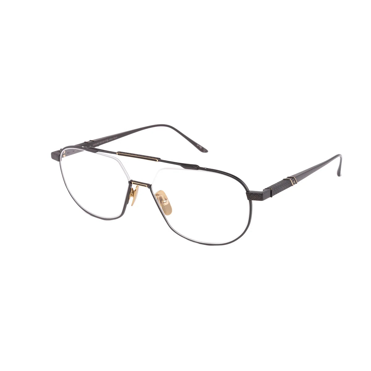 Introducing the Leisure Society Yuma by Leisure Society: black aviator-style eyeglasses crafted from titanium with a slender metal frame, adorned with gold ion-plated accents on the bridge and nose pads. These optical frames feature clear lenses and are showcased against a white background for a modern, luxurious appeal.