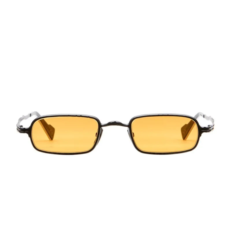 Sunglasses with orange lenses and black frames on a white background