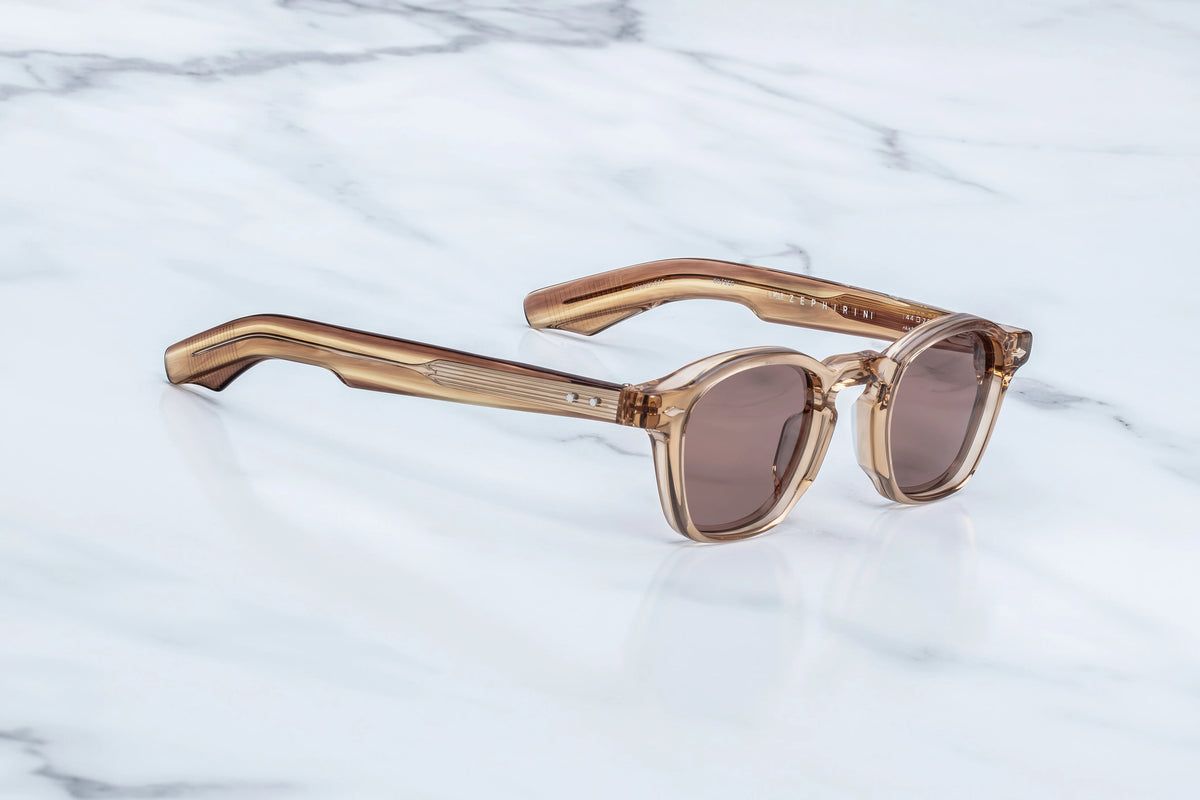 Jacques Marie Mage Zephirin spectacles in hand-finished translucent tan acetate with a keyhole bridge and brown lenses.
