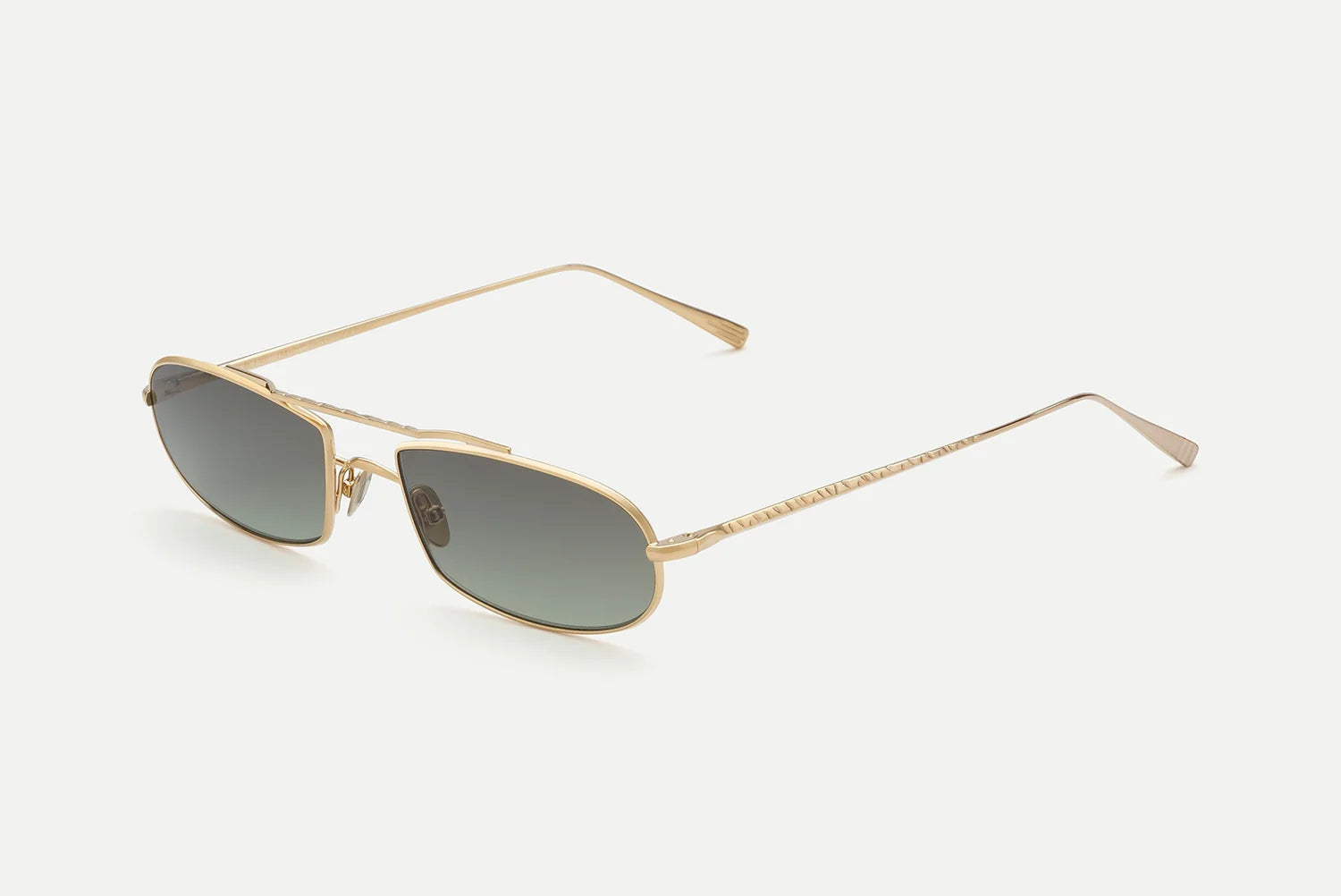 AHLEM Guerin by AHLEM: Gold-framed unisex sunglasses featuring rectangular, dark tinted lenses and thin arms, handcrafted in France with 100% UV protection, displayed against a plain white background.